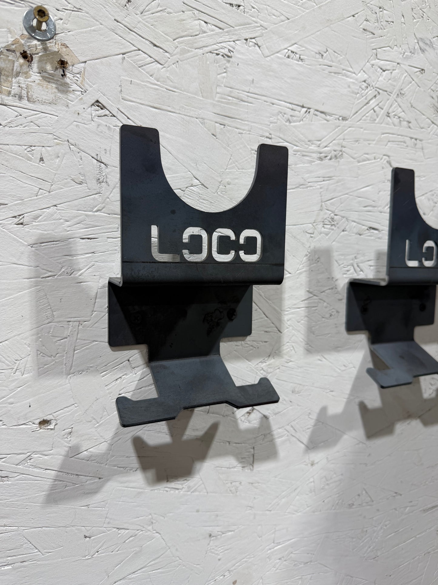 Grinder Hanger with integrated extension cord hanger